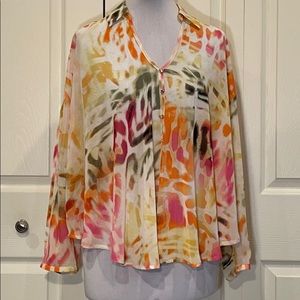 Jennifer Lopez Swing Top with Sexy Arm Cutout